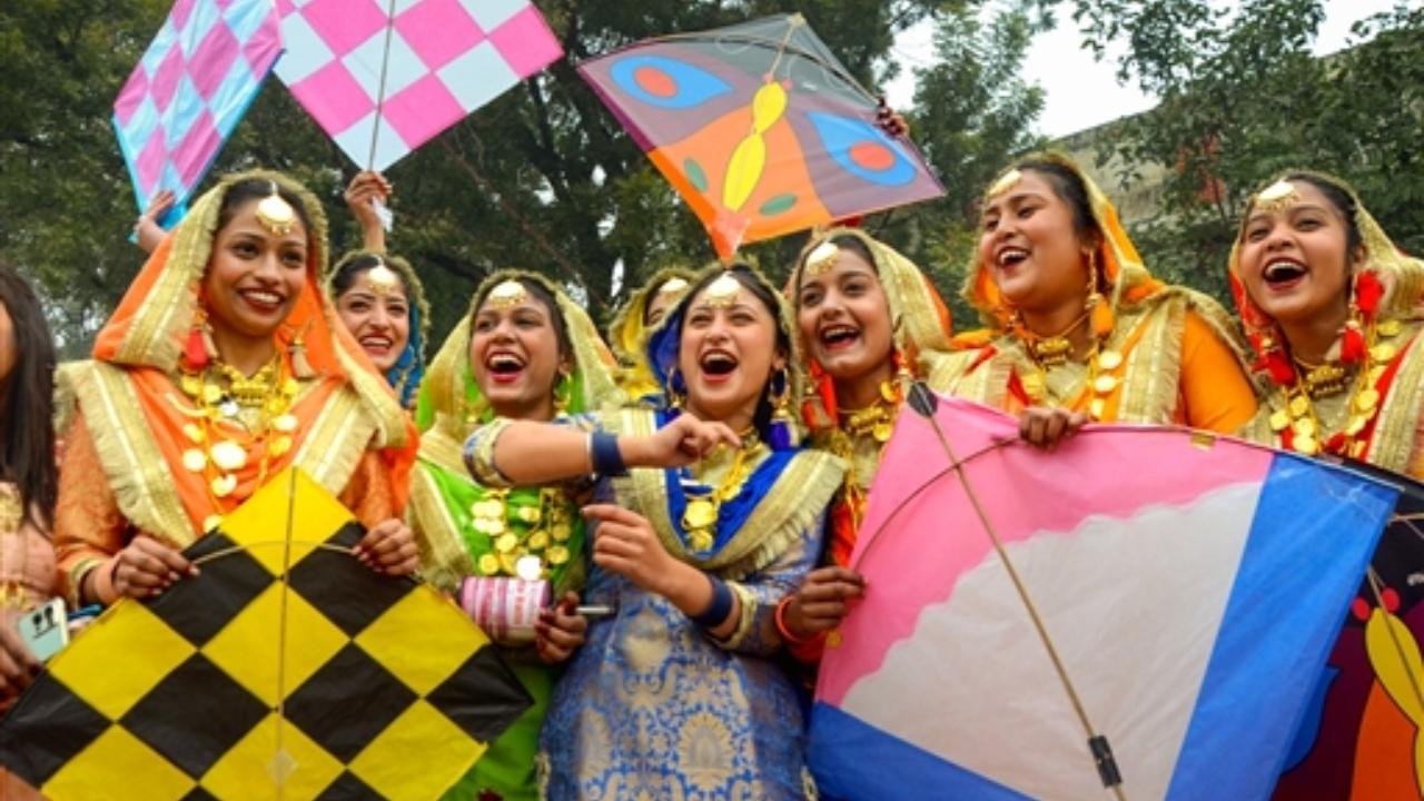 Students of Shahzada Nand College with their kites on the eve of 'Makar Sankranti' festival Pic/PTI