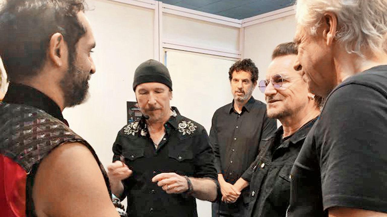 Karsh Kale (left) with Edge and Bono from U2