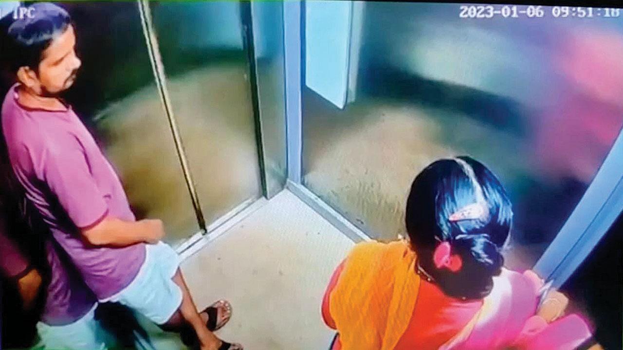Screengrab from the CCTV footage that shows the accused touching his private parts in front of the woman in the lift