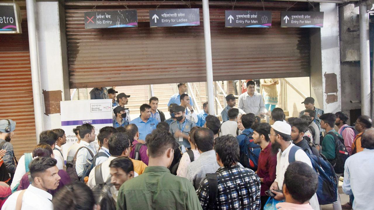 Commuters are stopped from entering Ghatkopar Metro station, as services were closed for 2 hours for PM’s visit. Pic/Sameer Markande