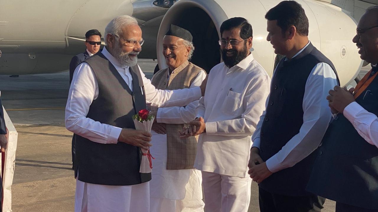 PM Modi at Mumbai airport on Thursday. Pics PMO and Maharashtra Mantralaya