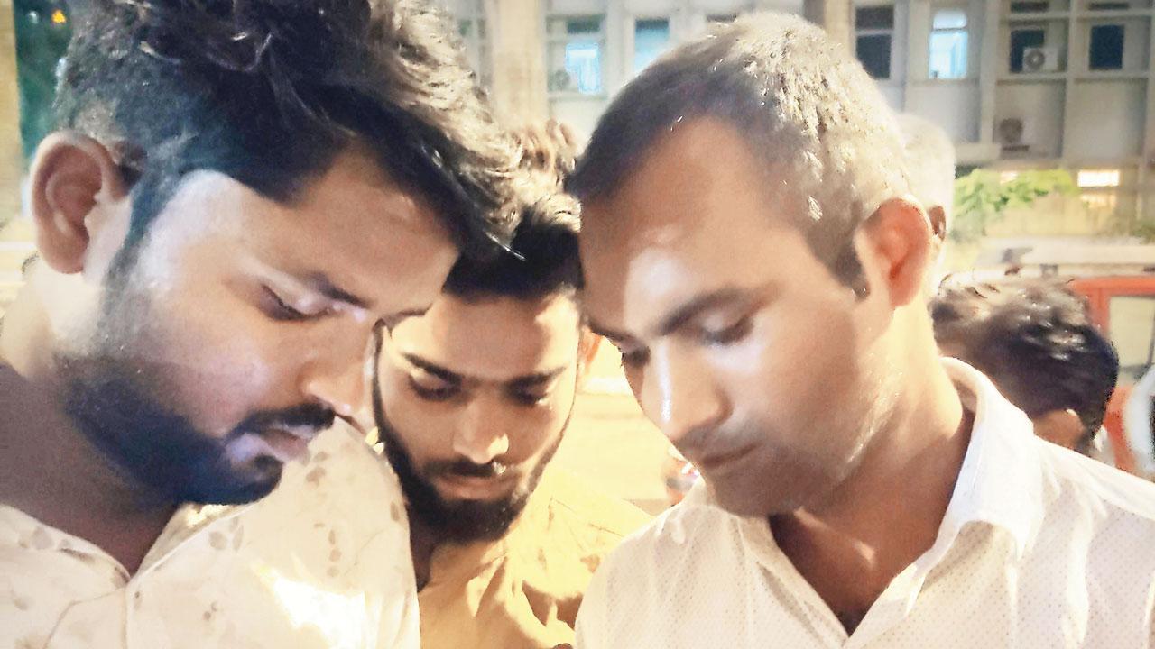Noor Mohammed (right), the brother of Noor Alam