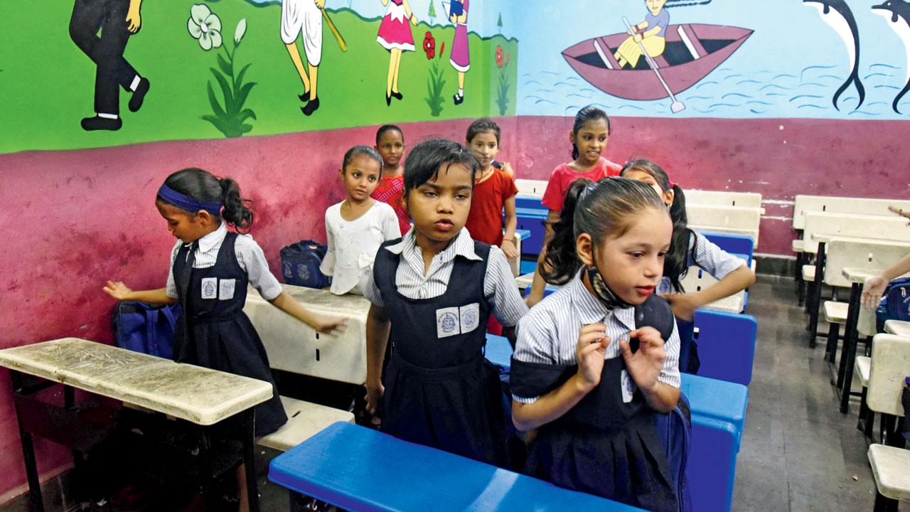 Children in a public school at Dharavi. File pic