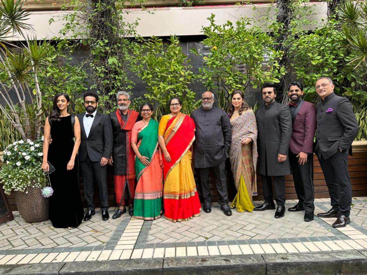 The team of RRR arrived for the Golden Globe Awards 2023 with their respective family members. All looked dapper in their outfits and made for a picture perfect moment as they posed together on the red carpet. Rajamouli's wife Rama, MM Keeravani's wife Srivalli, and Ram Charan's wife Upasana opted for traditional sarees for the occasion