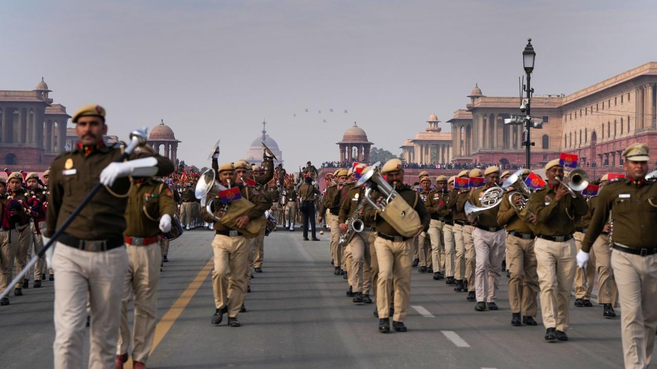 Delhi Police band marches past during rehearsals for the Republic Day Parade 2023 at Kartavya Path on Friday. Delhi Police women contingent also took part in the Republic Day Parade rehearsal