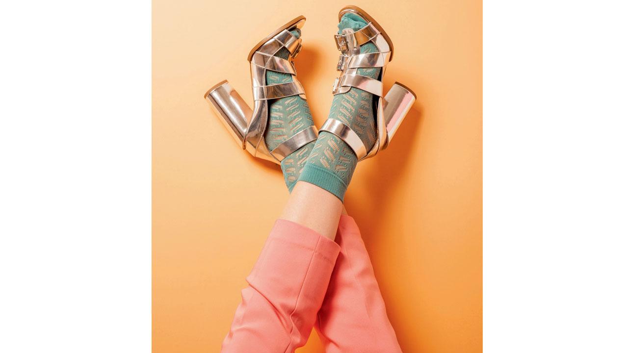 Pair socks with high heels or short dresses for a stylish look. Representation Pics