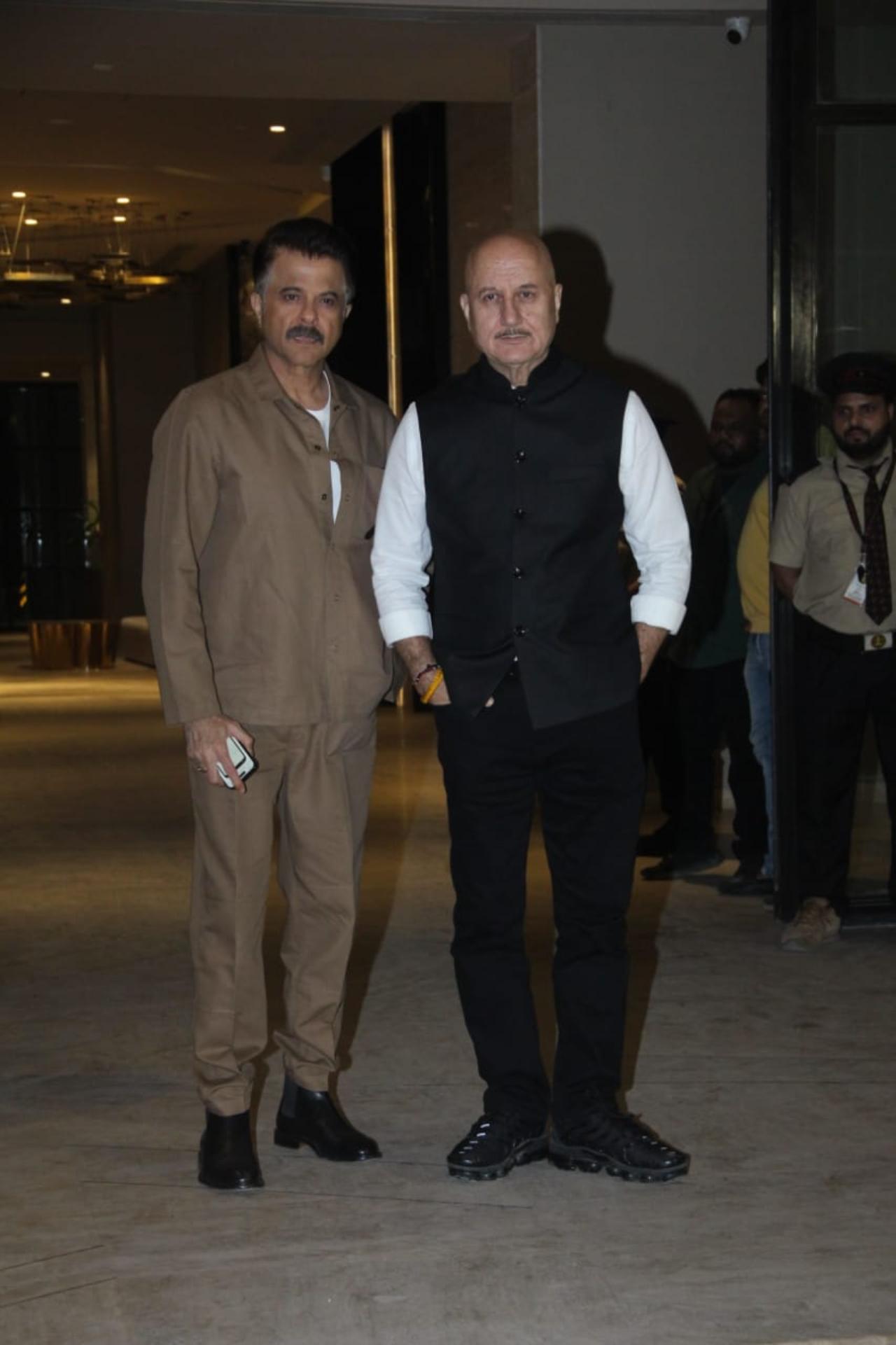 Anil Kapoor was seen dressed in a brown shirt and matching pants. He was accompanied by his close friend and actor Anupam Kher, who opted for a black and white outfit