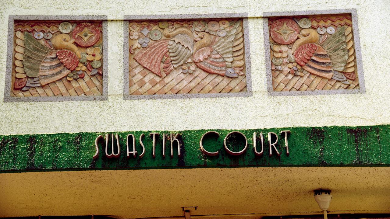 The bas-relief panel after restoration. Also seen is the lettering of the building highlighting its name, Swastik Court