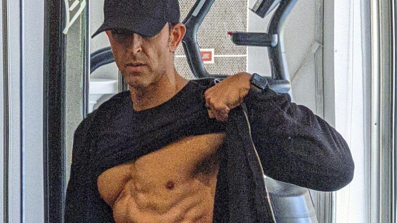Hrithik Roshan flaunts his chiseled 8-pack abs in latest gym selfies, check out! The 'War' actor took to Instagram and dropped photos of his chiseled 8-pack abs. In the photo, the actor is seen standing in front of the mirror. For the photos, the star lifted his black t-shirt to give a clear view of his abs. Full Story Read Here