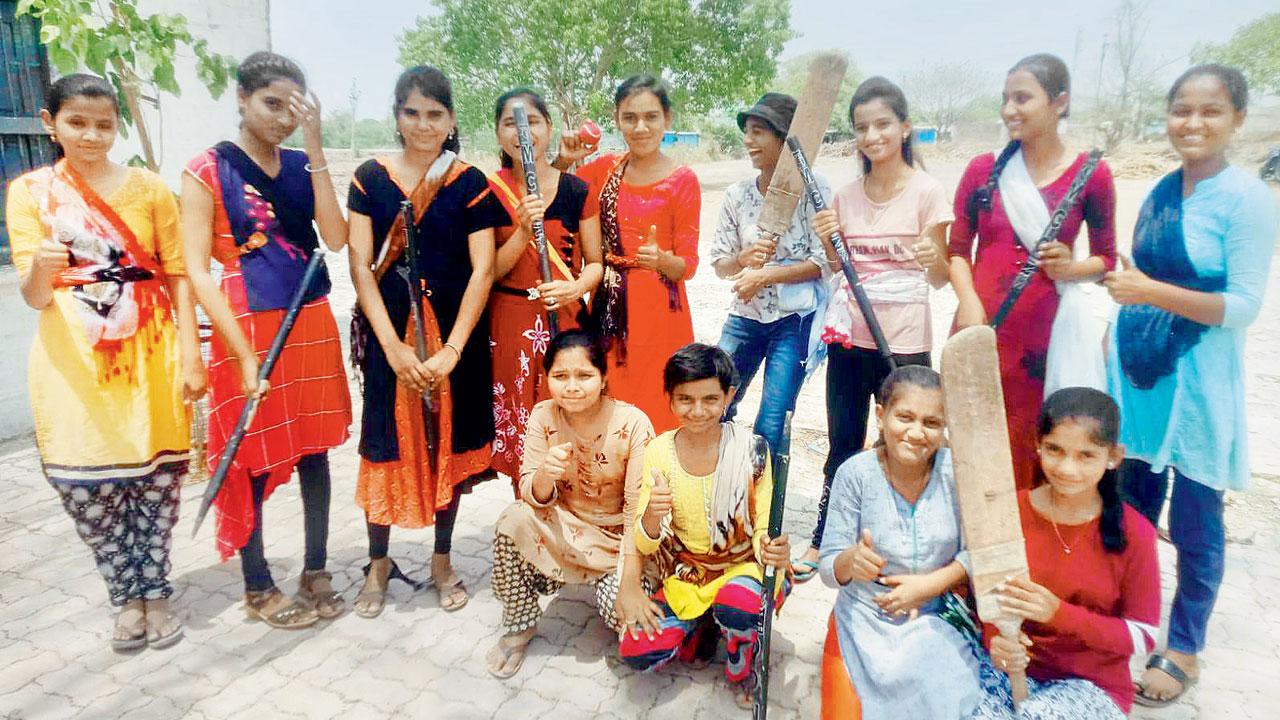 A girls’ cricket team at Nalgir village in Latur
