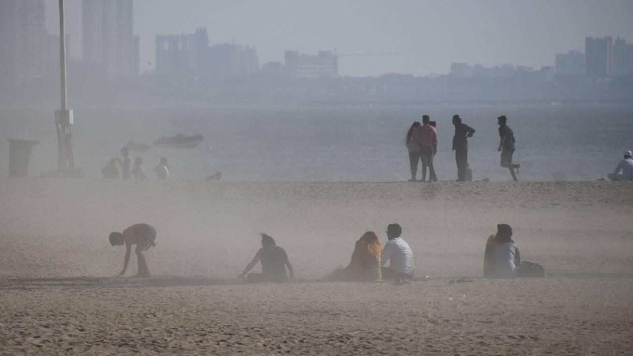 Commoners can be seen at the seashore in Mumbai amid the cold weather.