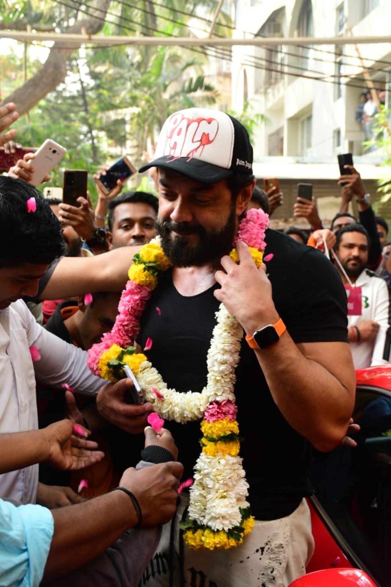 Bobby Deol has been a part of the film industry for over 25 years now. The actor who turned 54 today stepped out of his house to celebrate his day with fans who gathered outside his house