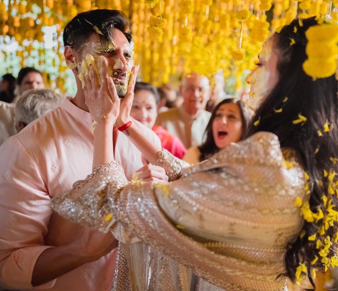 Athiya also shared a picture with her brother Ahan Shetty where the two are seen applying haldi on each other. Ahan had also shared pictures of him walking Athiya down the aisle towards the mandap and picture with the newlyweds