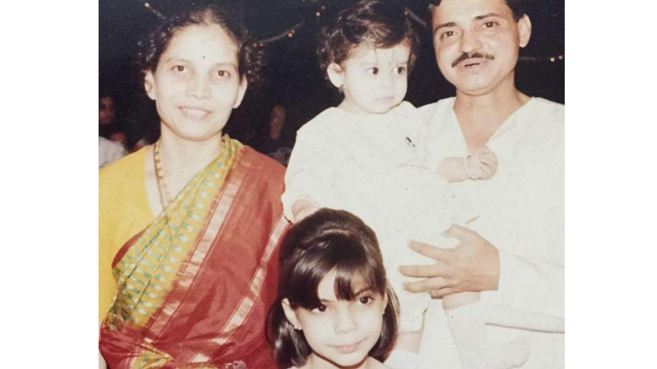 Mithila's first Birthday - The cutest snap ever! Mithila all of 1 is seen posing away with her parents and sister Radhika Palkar. Looking at pose and style, she was made for the arclights from age one itself!