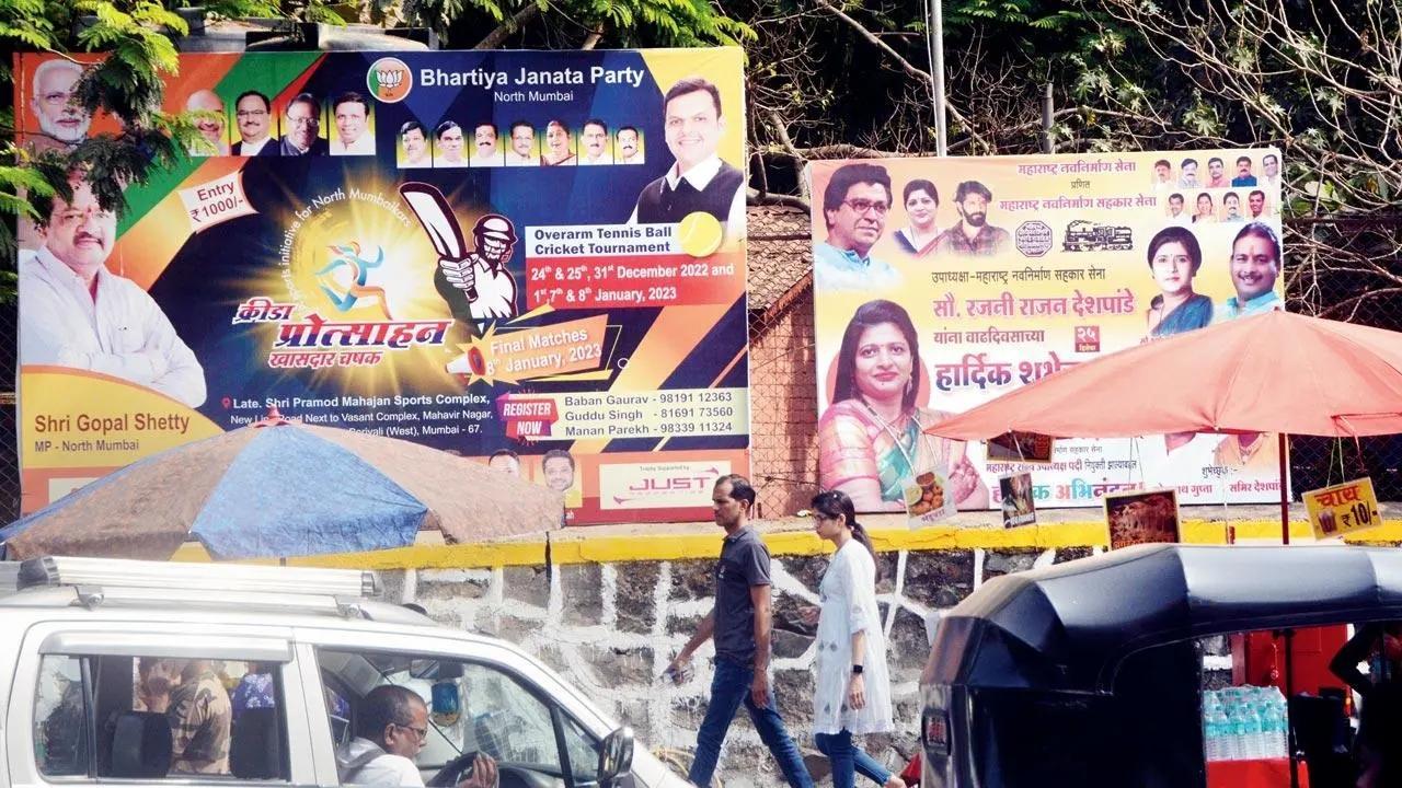 Political hoardings at the boundary wall of SGNP in Borivli on Sunday. Pic/Satej Shinde