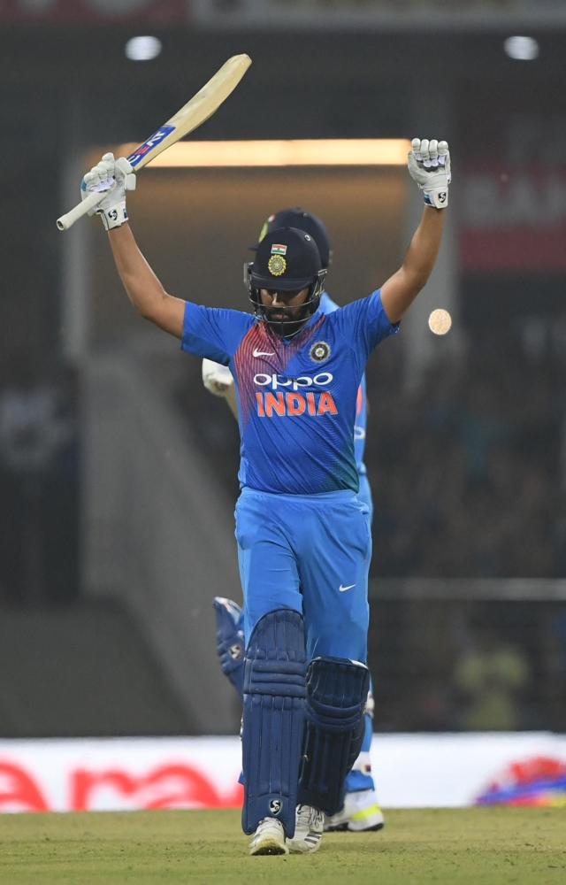 India`s Rohit Sharma celebrates his century against West Indies at the Shri Atal Bihari Vajpayee Ekana Cricket Stadium on November 6, 2018. PIC/AFP