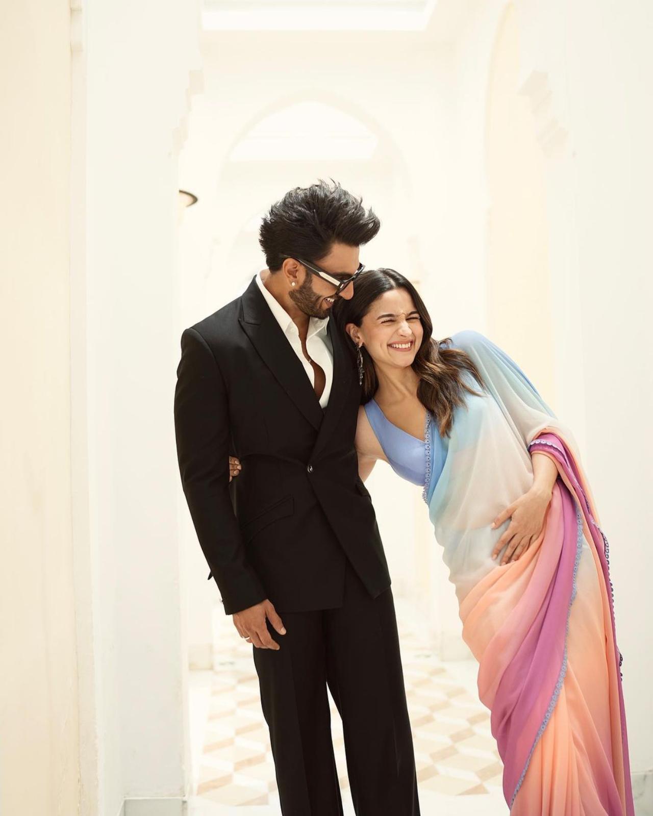 Karan Johar several fun behind-the-scenes moments from the sets of Rocky And Rani. From Alia stumbling over her saree to Ranveer offering massages to tired crew members, the video captured several chaotic but memorable moments. Like in the BTS video, we can see Ranveer and Alia's offscreen playfulness and friendship - there's never a quiet moment with these two around!