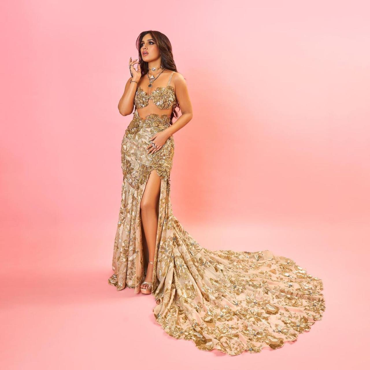 Bhumi Pednekar turned showstopper and was styled in a stunning embroidered fishtail lehenga with 3D flowers, a signature element of the 'Inner Bloom' collection. Pednekar's makeup comprised smoky eyes, contoured cheeks and minimal blush, accentuating her refined, whimsical look