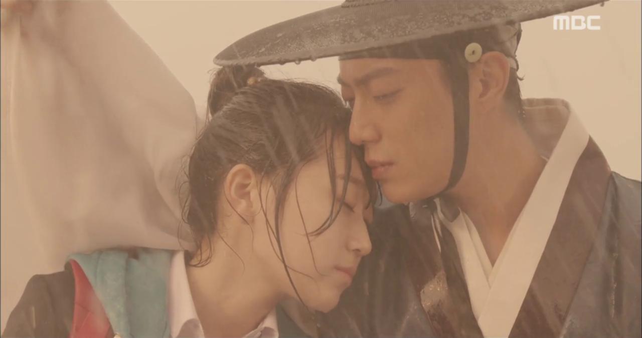 Splash Splash Love
Dan Bi (Kim Seul Gi) and Lee Do (Yoon Doo Joon) are couple goals as they run as dance in the rain. In a heartwrenching moment, they are ripped from each other's arms in the subsequent scenes. This is a couple we can't help but root for with all our hearts