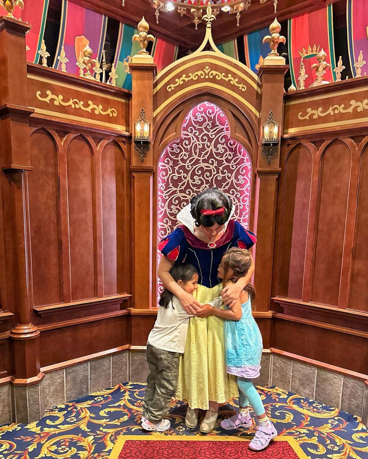 Disneyland is every child (and adult's) dream come true - here is Inaaya hugging Snow White tightly