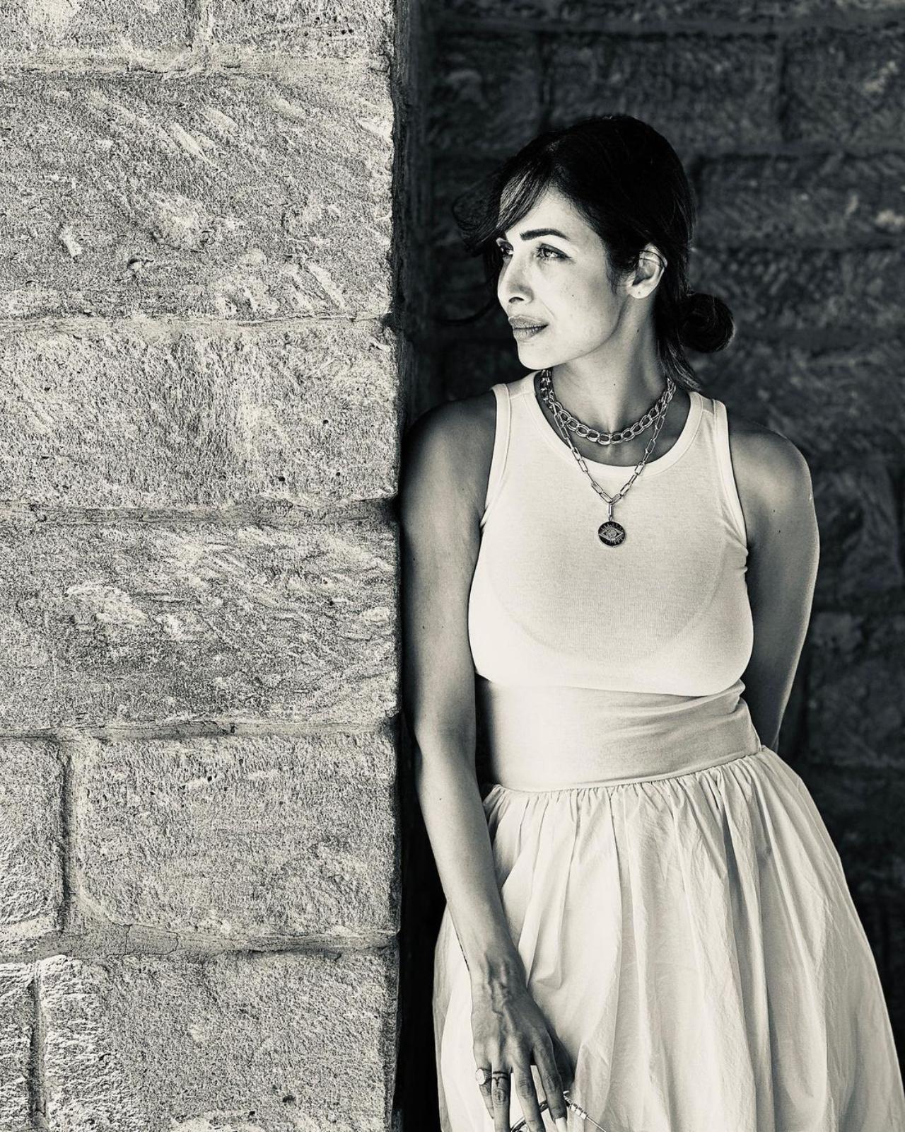 Malaika looks absolutely stunning in this monochrome photo as she gazes to the left of the frame - probably at the beautiful landscapes of Baku Malaika looks absolutely stunning in this monochrome photo as she gazes to the left of the frame - probably at the beautiful landscapes of Baku