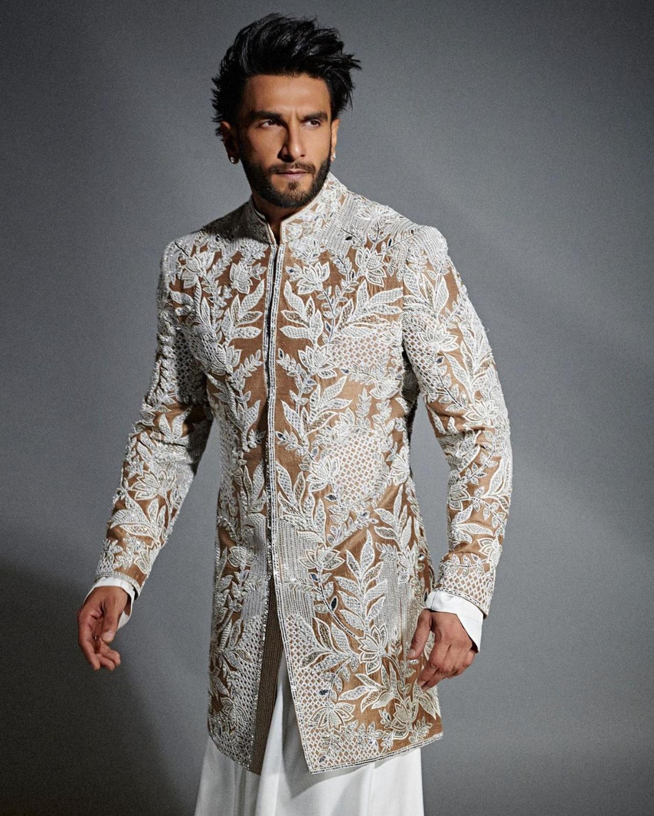 Ranveer looked ever the charming hero in his classy silver bandhgala