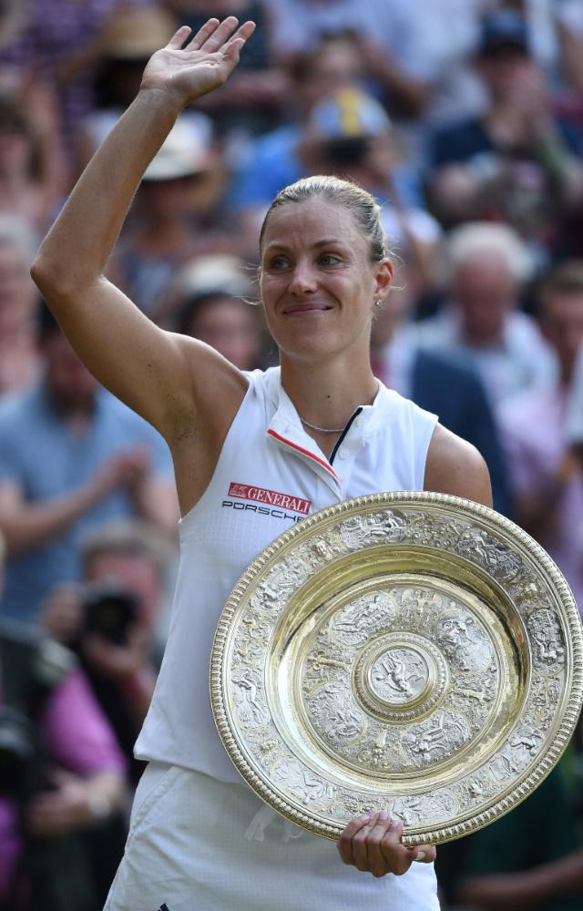 Germany’s Angelique Kerber beat seven-time champion Serena Williams 6-3, 6-3 to win maiden Wimbledon title.