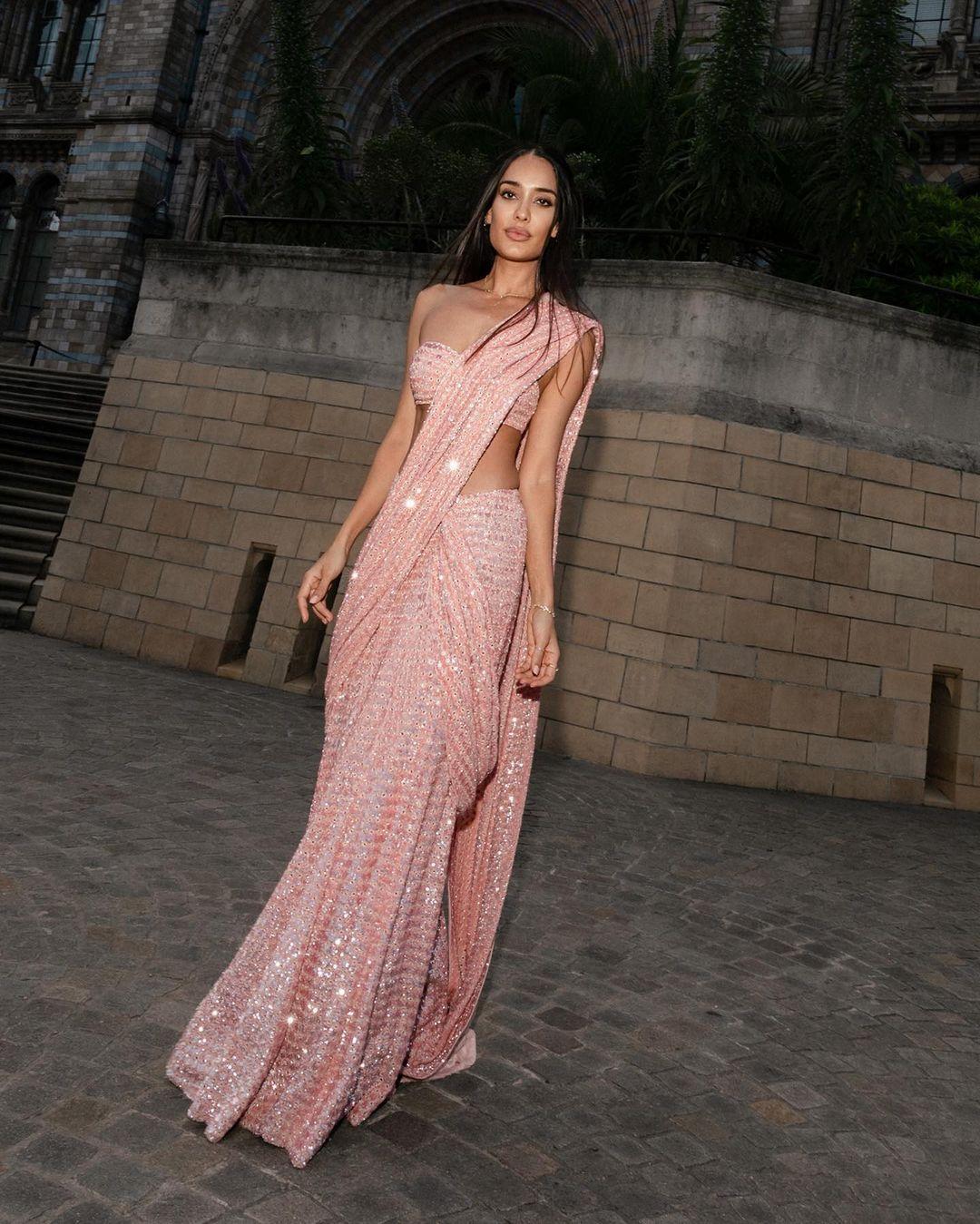 Pink perfection: Lisa Haydon embraces glamour in a stunning saree with shimmering embellishments, courtesy of Arpita Mehta