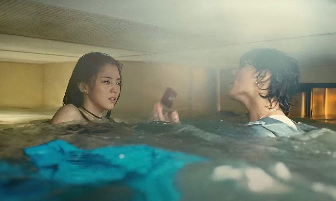 In the music video, Jungkook plays a man who persistently pursues his partner, played by 'The World of the Married' actress Han So-hee, despite their constant bickering and her apparent disregard of him.