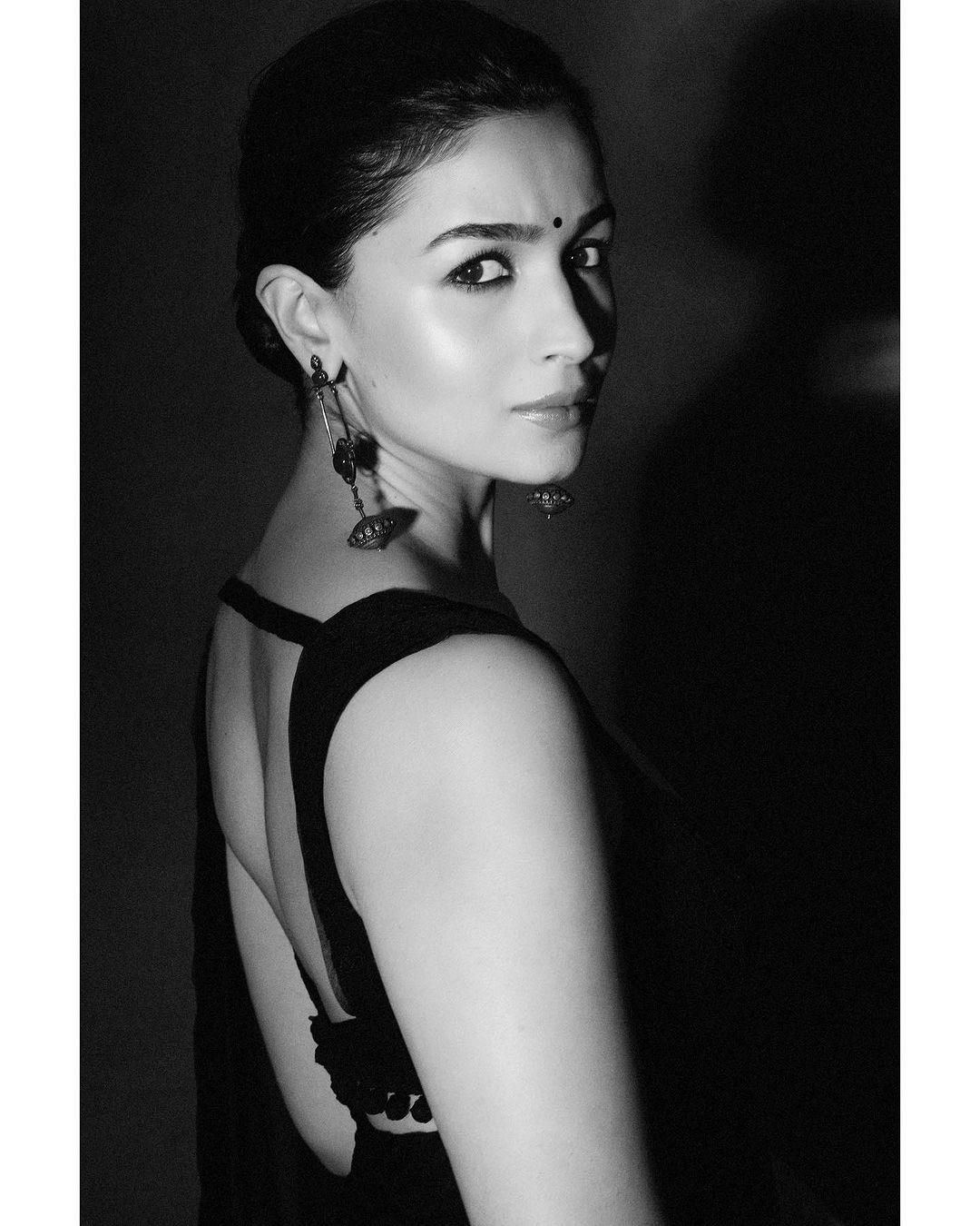 Eyes That Speak: Alia's black and white saree collection features her expressive kajal eyes and a beautiful bindi.