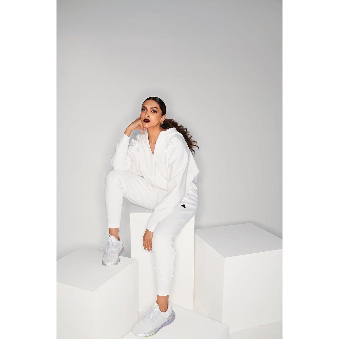 Deepika captivates in an immaculate white set, showcasing her flair for minimalistic sophistication. A true style icon!