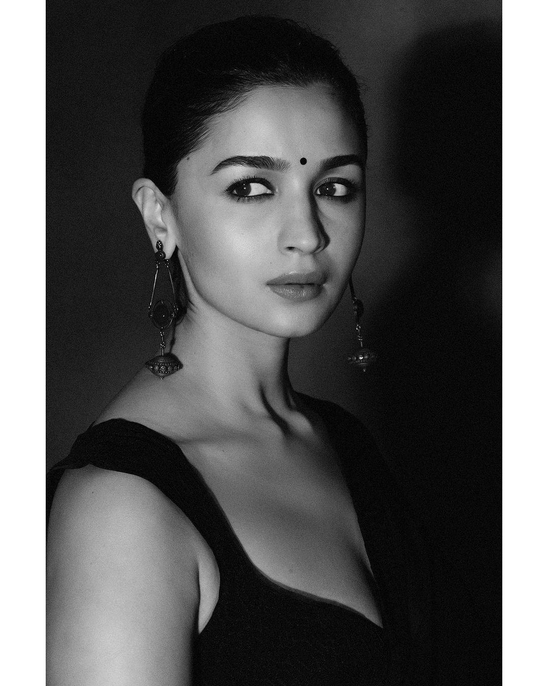 Monochrome Magic: Alia stuns in a saree with dramatic kohl eyes and a striking bindi, a perfect blend of tradition and elegance
