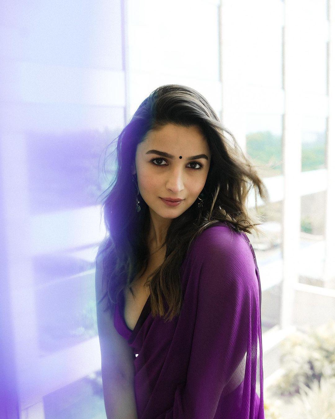 A vision in violet! Alia Bhatt's purple saree look steals the spotlight at the promotional event.