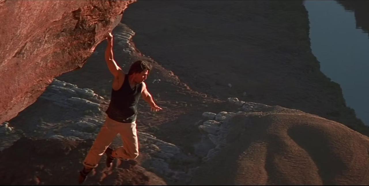 The second film of the franchise opens with a spine-chilling free climbing sequence. It seems Ethan Hunt enjoys daredevilry even during his time off. Cruise hanging off the red rocks is quite literally - a cliffhanger
