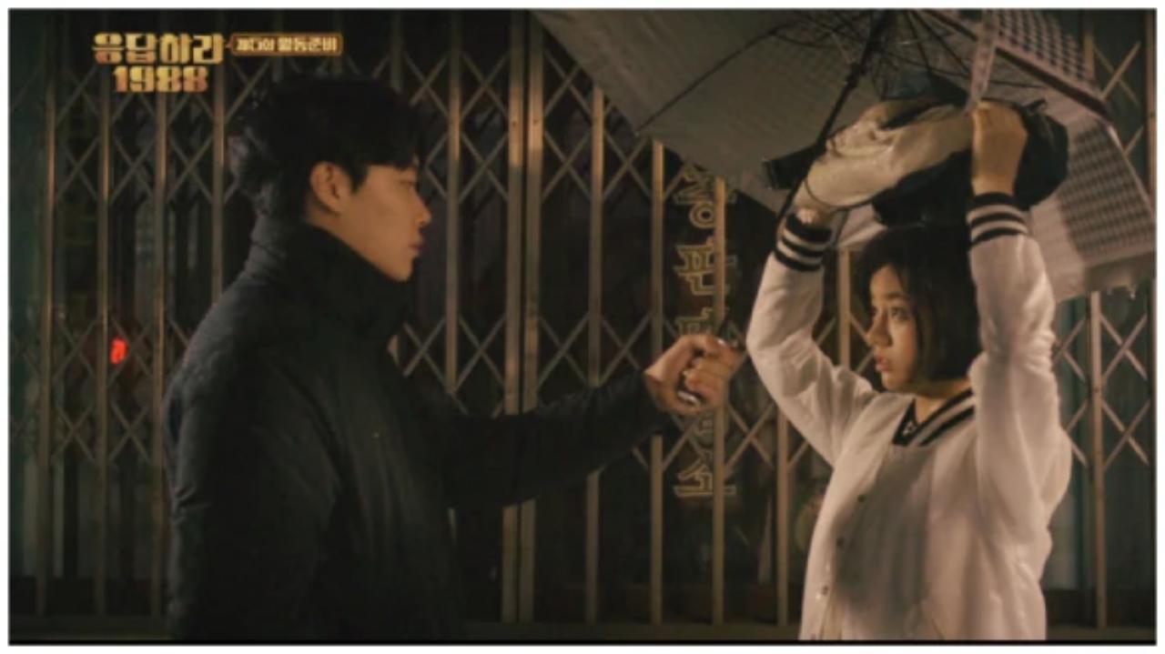 Reply 1998 
This Kdrama made hearts break again and again - especially the love triangle between Deoksun, Jung Hwan and Choi Taek. This is one of the moments where Jung Hwan secretly shows Deok Sun that he likes her - if only she would catch on!