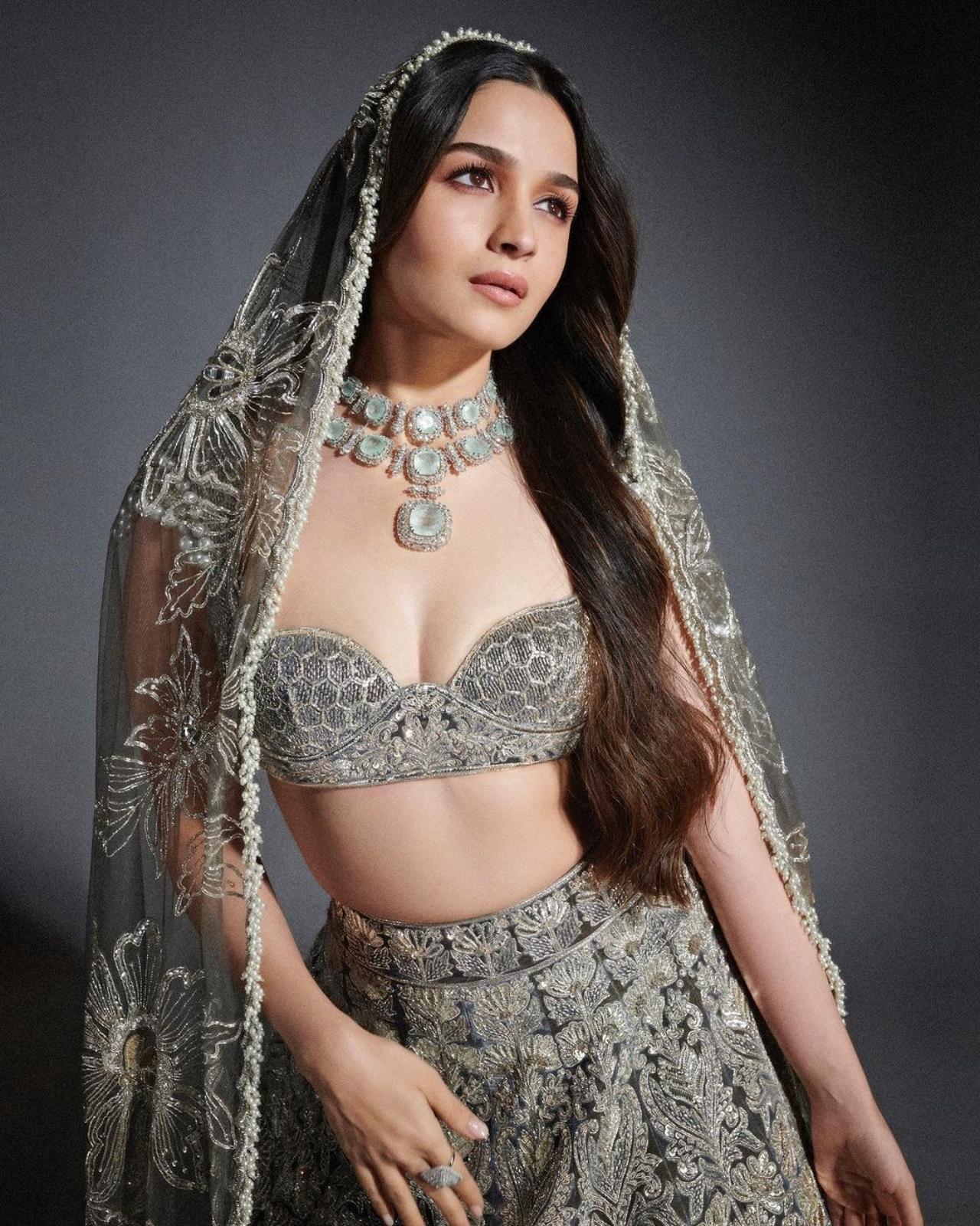 How gorgeous does Alia Bhatt look in her silver bejewelled lehenga? Rocky is definitely going to be 'blinded' by love!