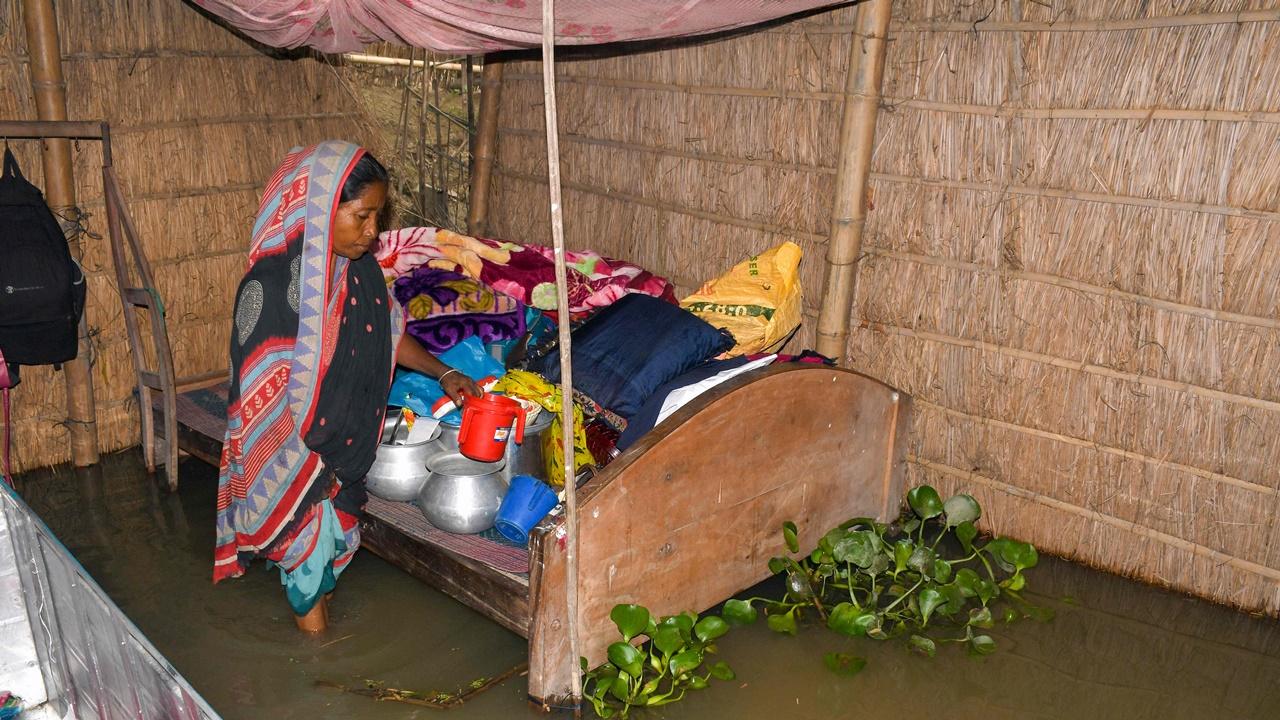 A woman said that the flood waters had damaged all her household items. Pic/AFP