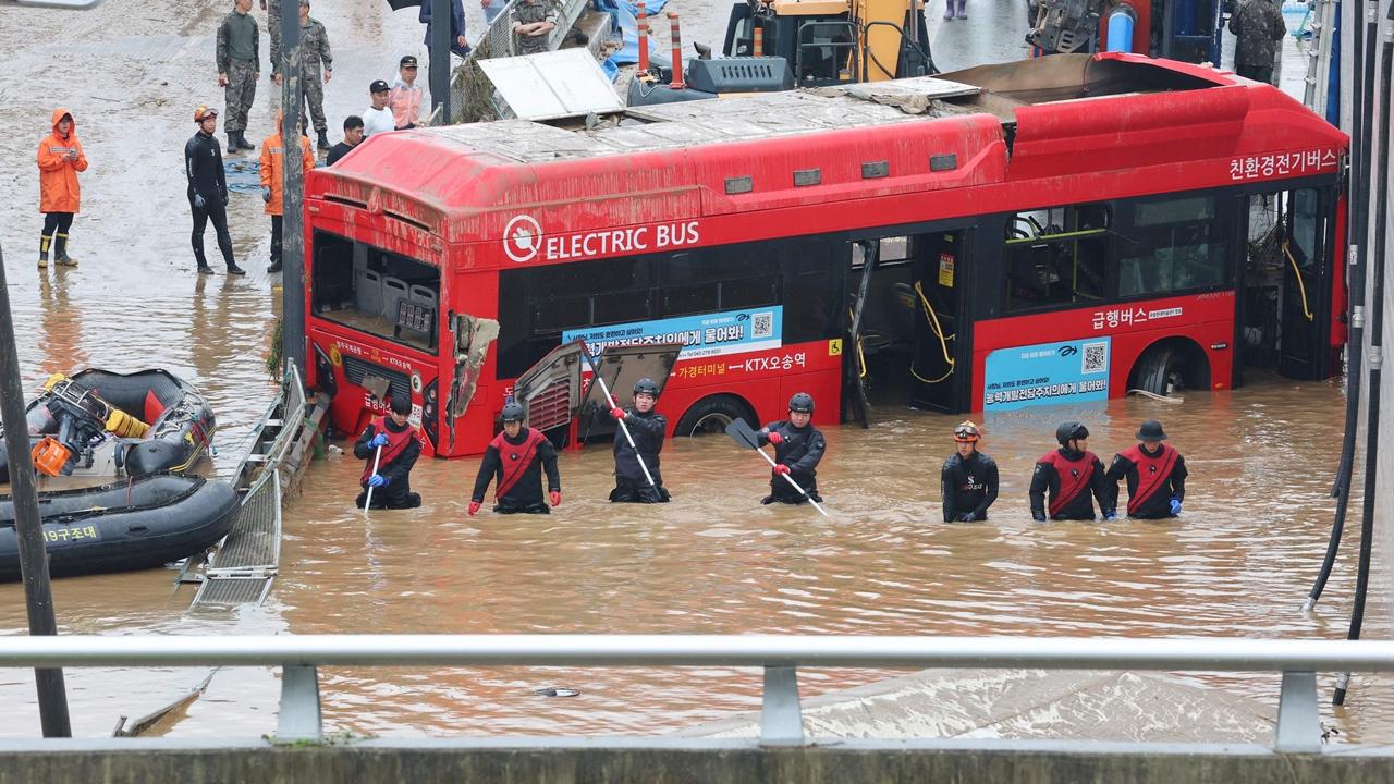 The government has deployed nearly 900 rescue workers to the tunnel who have so far pulled up 13 bodies and rescued nine people who were treated for injuries. It wasn’t clear how many people were in the submerged cars.