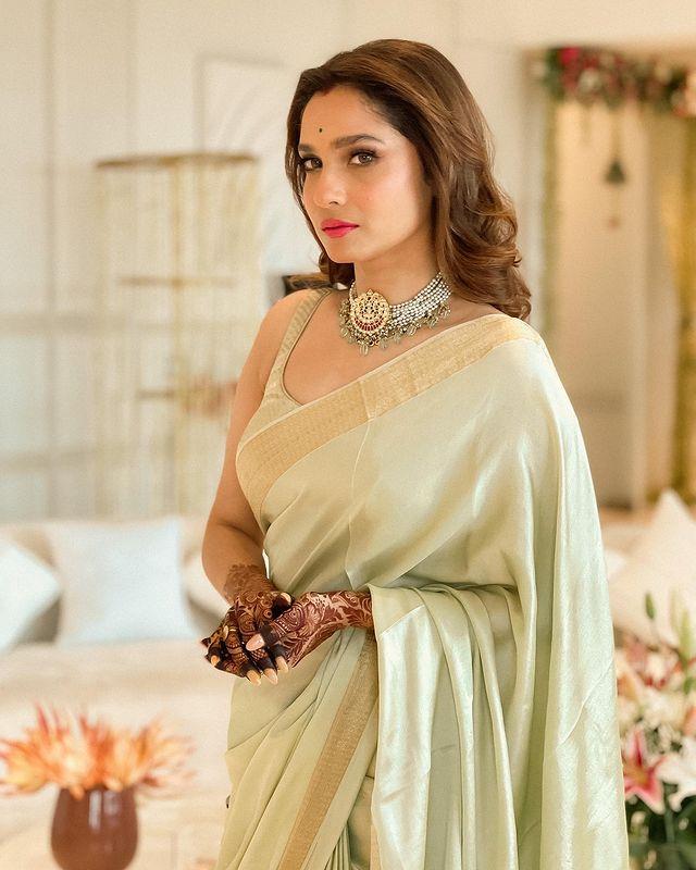 In this look, Ankita gives a modern pastel twist to the saree 