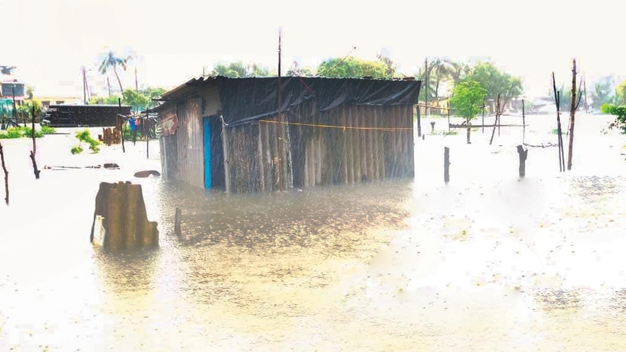  A hut submerged in floodwaters