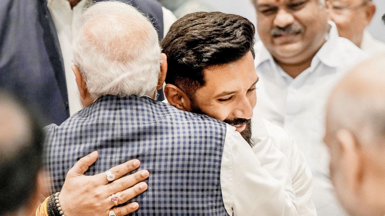 PM Narendra Modi hugs LJP (Ram Vilas) chief Chirag Paswan, in New Delhi, Tuesday. Pic/PTI