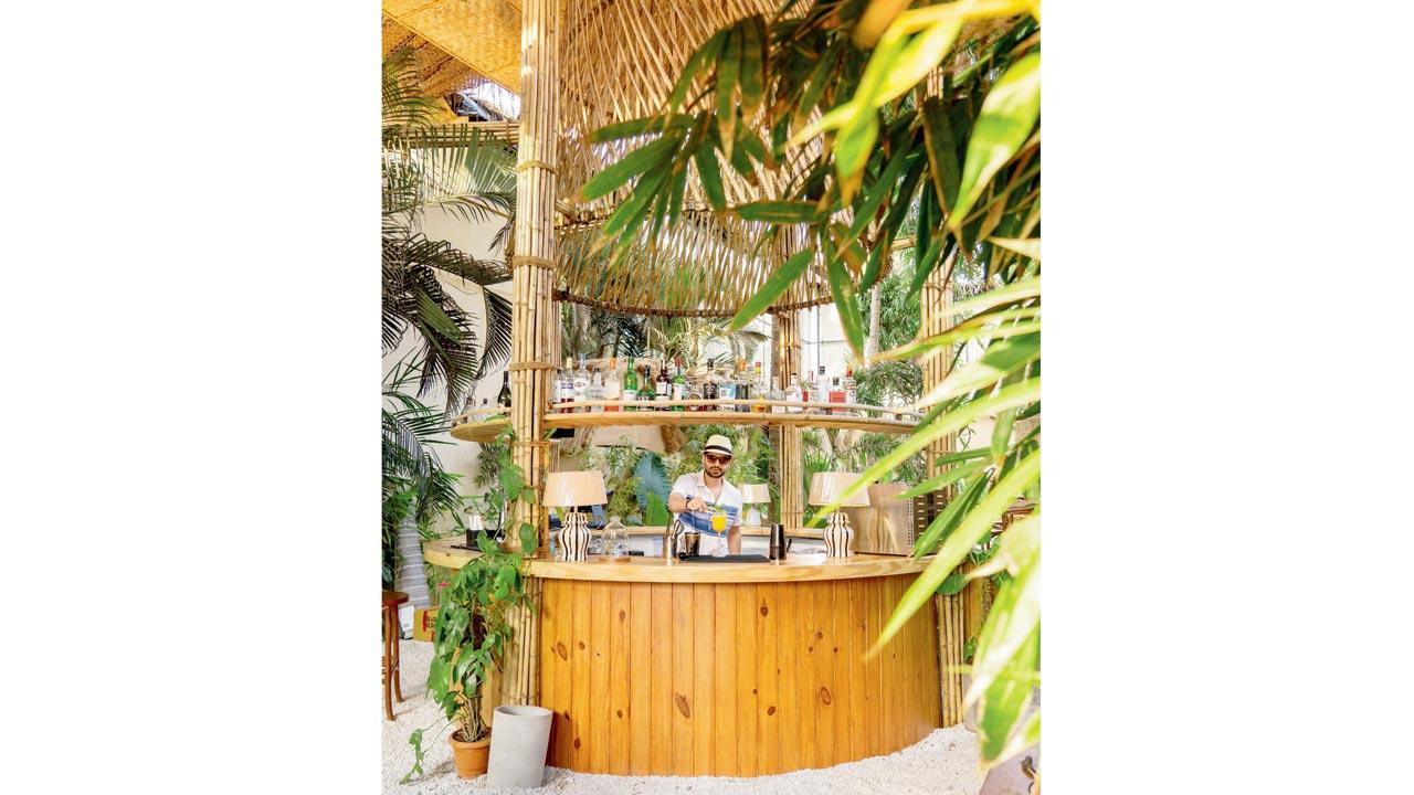 The towering hourglass-shaped bar was created by a team of eight artisans over 400 hours