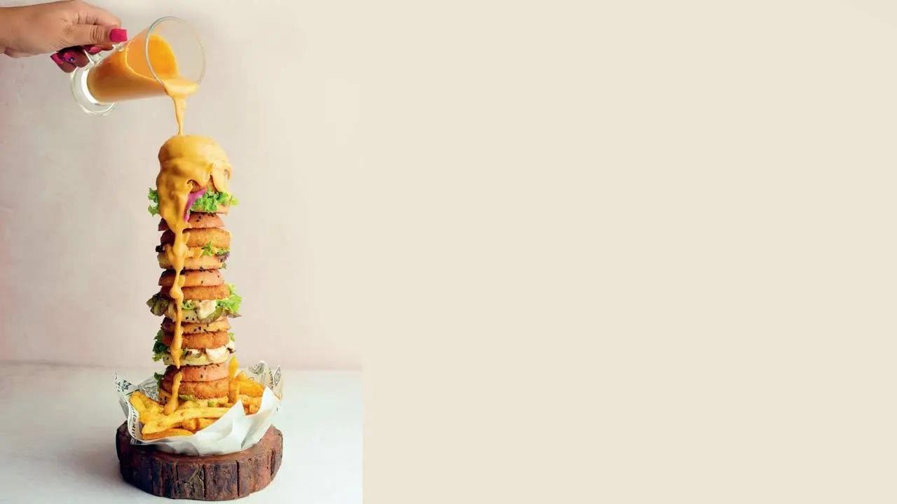 Biggiesmalls: Technically a collection of small burgers skewered together to make a burger tower, it entails four different sliders (veg/chicken/b*ff) on a bed of hand-cut French fries, and is drenched in signature cheese sauce. At Frisbees, Hill Road, Bandra West; Shivaji Park, Dadar Log on to Zomato; Swiggy; Thrive Call 7039857409 (Bandra) Cost Rs 550 (vegetarian); Rs 650 onwards (non-vegetarian) 