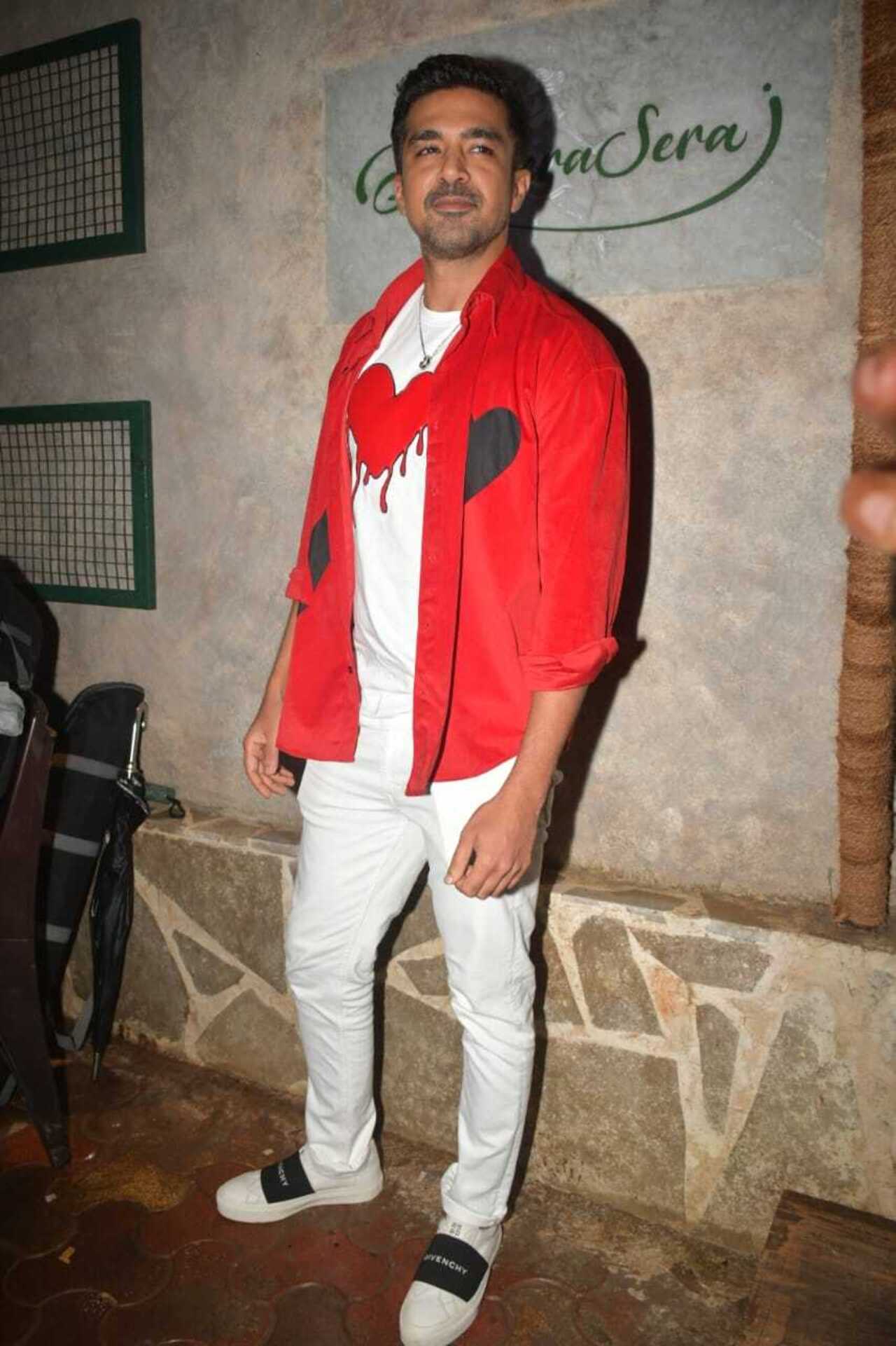 Shaqib Salim wore a white T-shirt with a red heart printed on it and paired it with a matching jacket for sister Huma's birthday celebration