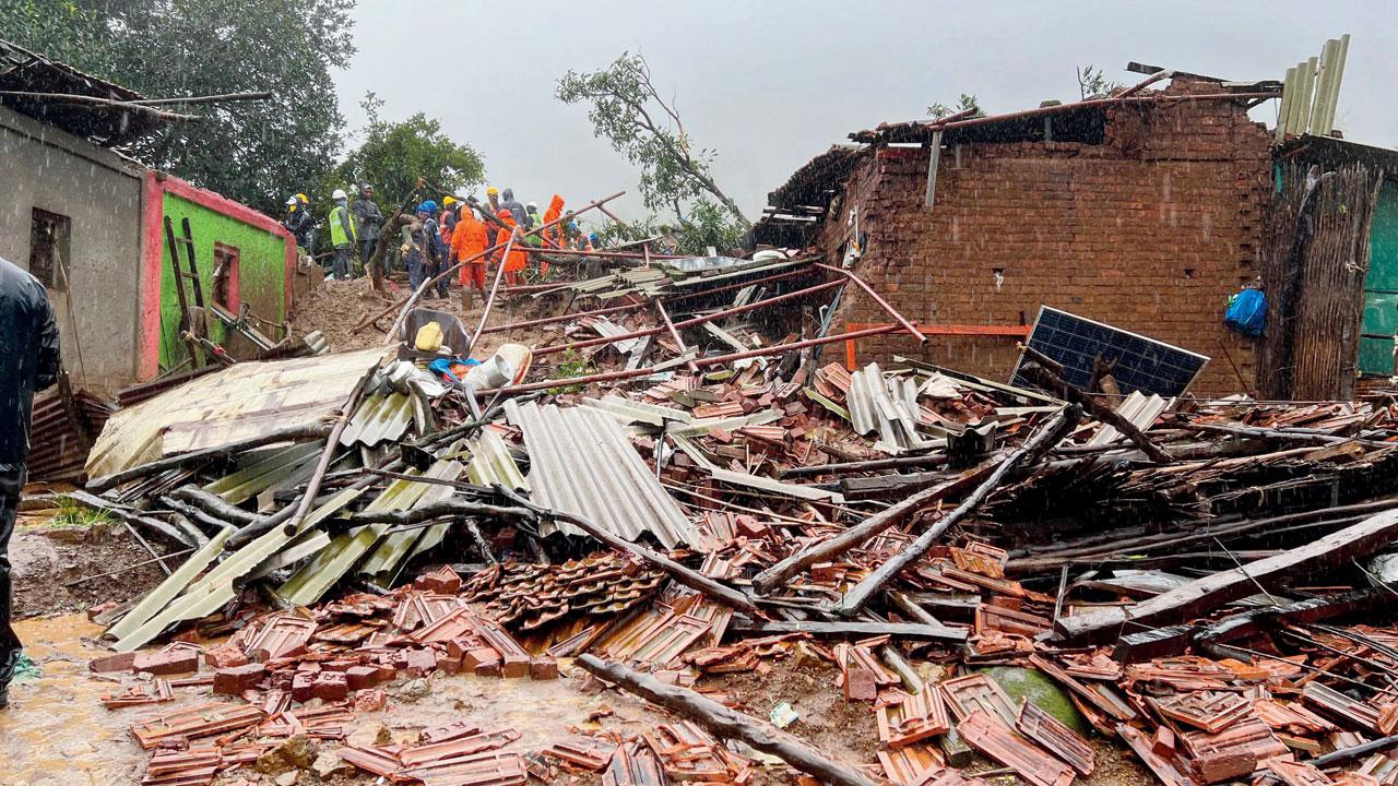 An NDRF team near the debris in Irsalwadi. Pic/Faizan Khan