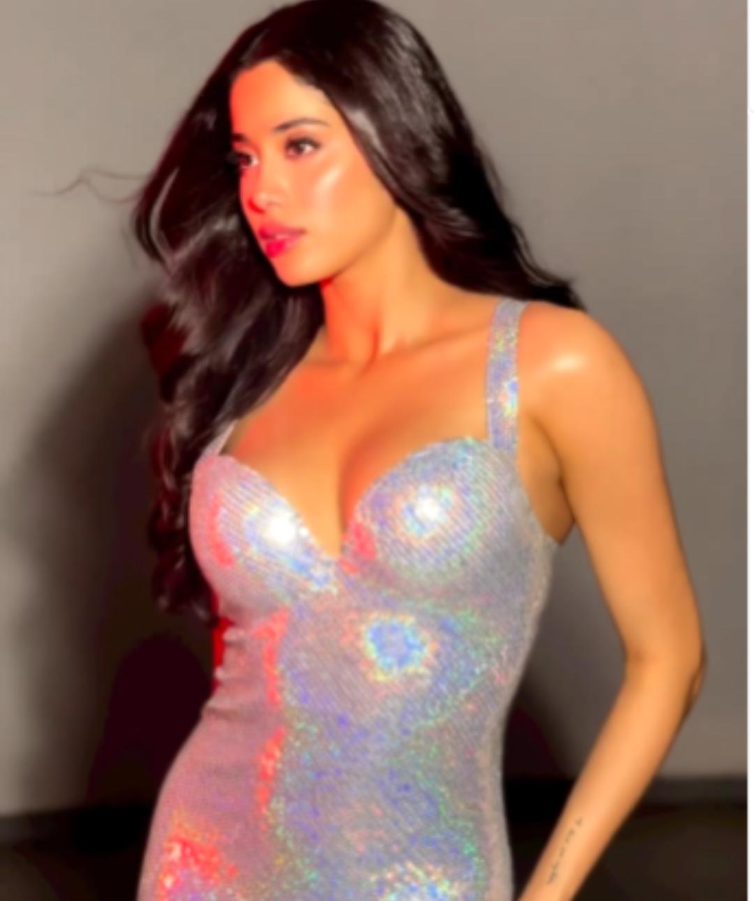 Shimmer and shine: Janhvi's glittery silver gown is a red carpet showstopper