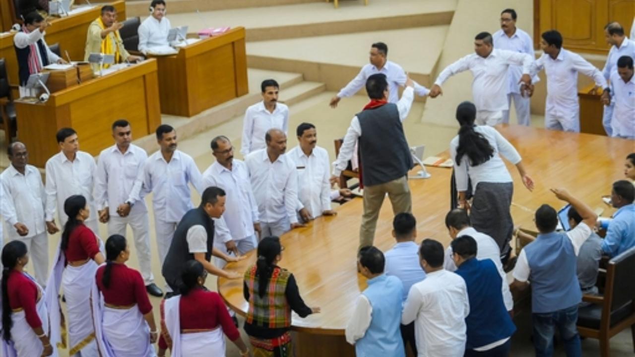 The Speaker initially asked the opposition members to stop their protest inside the House and said he would reconsider the suspension but as they staged the walkout, Sen did not revise the order
 
