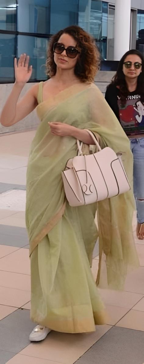  In a sage green saree, Kangana effortlessly served charm through this graceful look