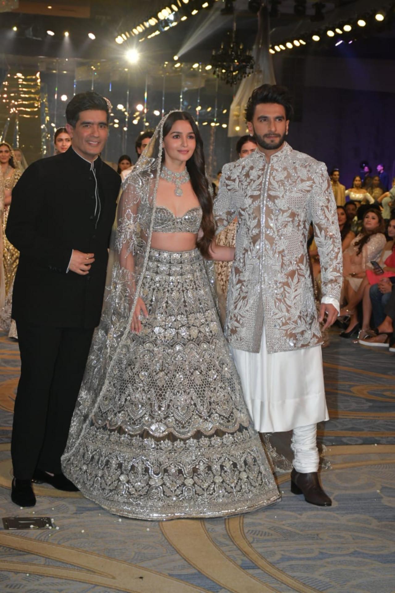 Manish Malhotra joins his showstoppers flaunting his collection