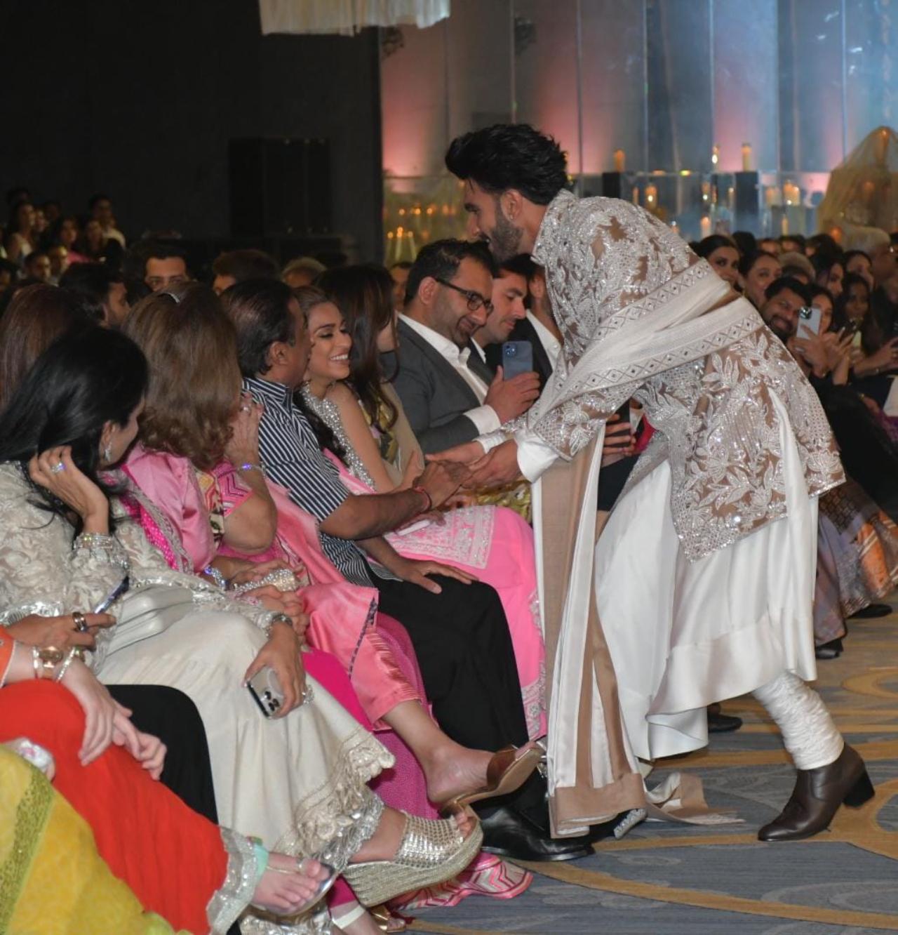 Ranveer Singh also took a moment to greet businessman Mukesh Ambani
